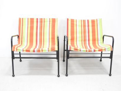 SUEDE: Pair of tubular metal garden armchairs...