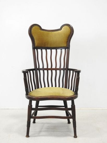 ARTS & CRAFTS wood and velvet wing chair....