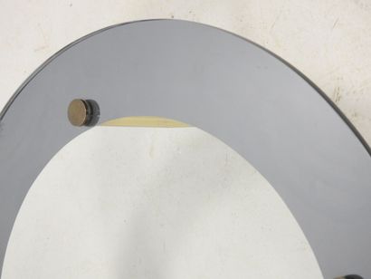 LOW TABLE with circular glass top resting...