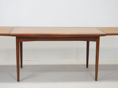 Rectangular teak table with extensions. Circa...