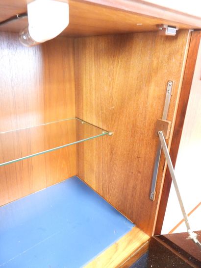 Scandinavian rosewood bar cabinet opening...