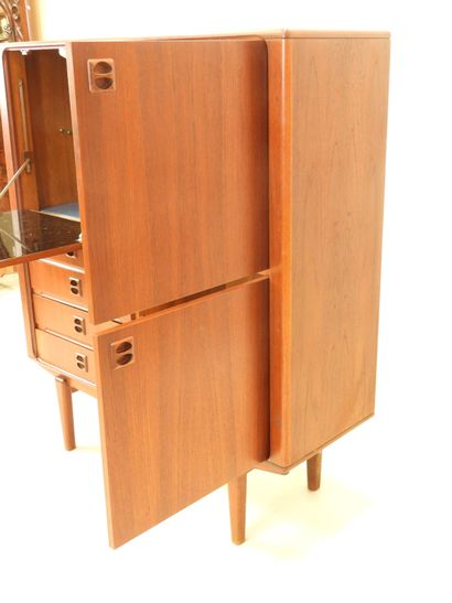 Scandinavian rosewood bar cabinet opening...