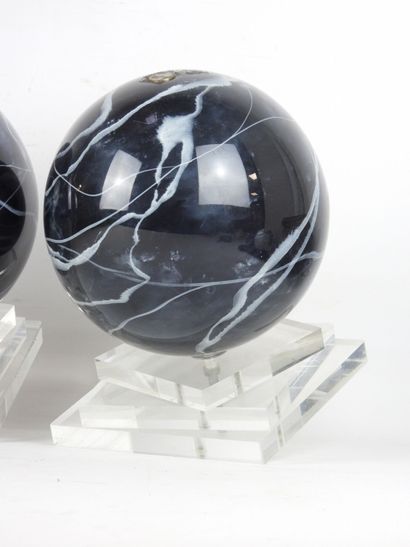 Three resin Balls on Plexiglas base. H. 29...