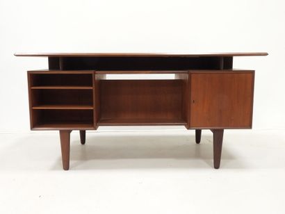 Scandinavian teak desk opening with a door...