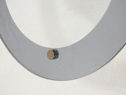 LOW TABLE with circular glass top resting...