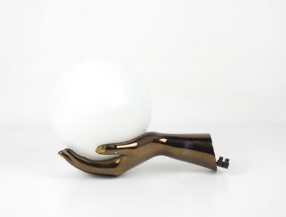MAISON ARLUS. Gilt bronze wall lamp in the...