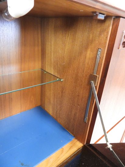 Scandinavian rosewood bar cabinet opening...