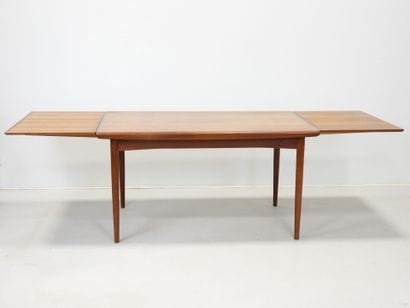 Rectangular teak table with extensions. Circa...