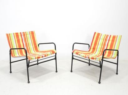 SUEDE: Pair of tubular metal garden armchairs...