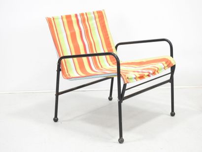 SUEDE: Pair of tubular metal garden armchairs...