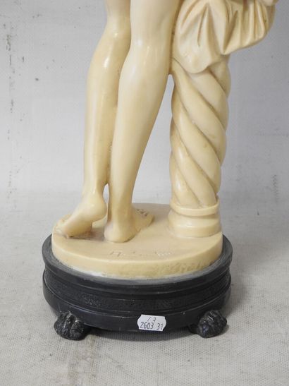 A. SANTINI 
Nu féminin mettant une rose dans...
