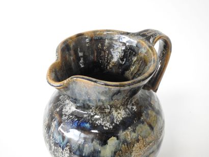 LA BORNE
Stoneware belly pitcher with detached...