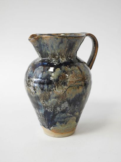 LA BORNE
Stoneware belly pitcher with detached...