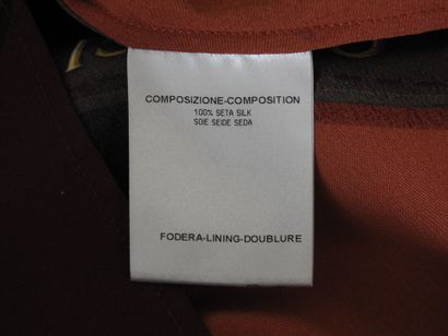 GUCCI
Chemisier en soie à décor de lanières...