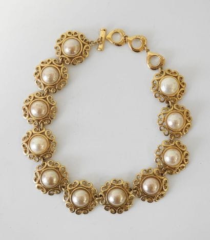 Yves SAINT LAURENT 
Gilded metal necklace...