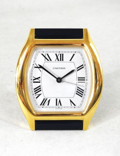 CARTIER
Gilt metal travel clock, blue Tortue...