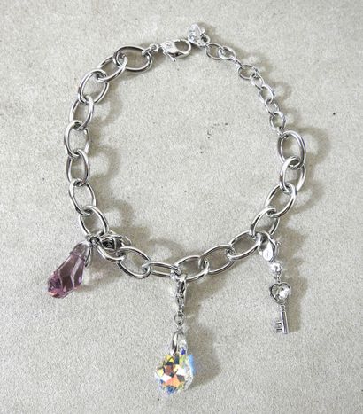 SWAROVSKY
Silver-plated curb chain set with...