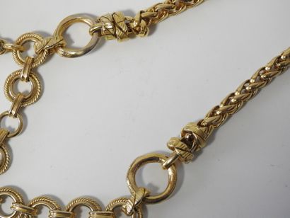 A large piece of costume jewelry, with gilded...