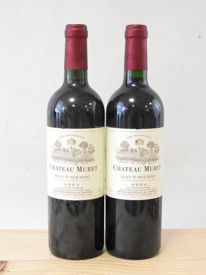 2 bottles 
Château Muret, Haut-Médoc, 2004.
Label...