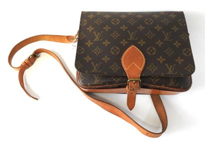 Louis VUITTON
Cartridge bag in monogram canvas...