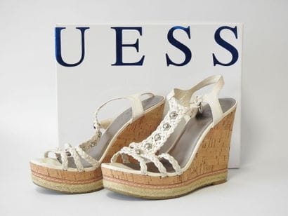 GUESS
Pair of white leather strappy wedge...