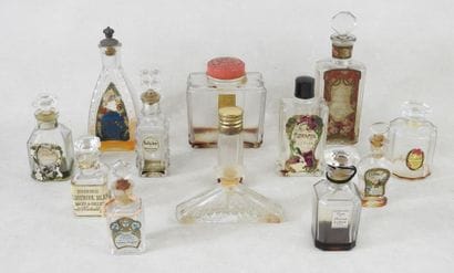 PARFUMS
Collection of 13 molded and pressed...