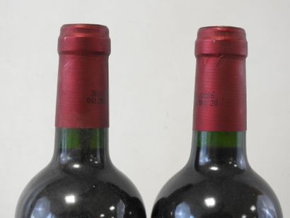 2 bottles 
Château Muret, Haut-Médoc, 2004.
Label...