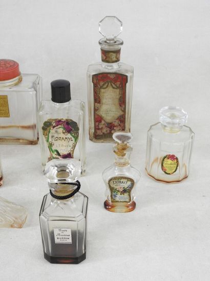 PARFUMS
Collection of 13 molded and pressed...