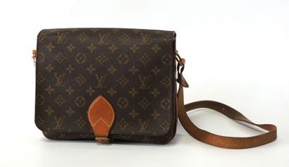 Louis VUITTON
Cartridge bag in monogram canvas...