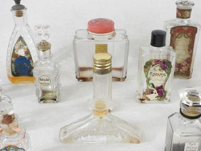 PARFUMS
Collection of 13 molded and pressed...