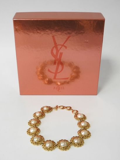 Yves SAINT LAURENT 
Gilded metal necklace...
