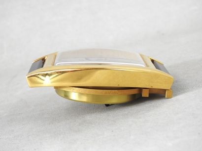 CARTIER
Gilt metal travel clock, blue Tortue...