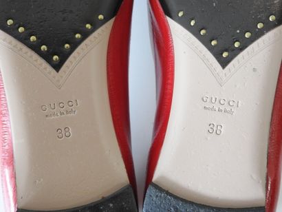 GUCCI
Pair of red leather ballet flats with...