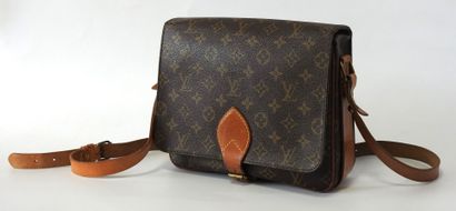 Louis VUITTON
Cartridge bag in monogram canvas...