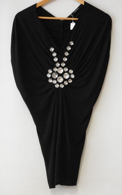 GIVENCHY
Tunique col V en modal noir agrémentée...