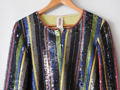 KENZO - Fashion show
Jacket decorated with...
