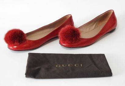 GUCCI
Pair of red leather ballet flats with...