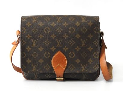 Louis VUITTON
Cartridge bag in monogram canvas...