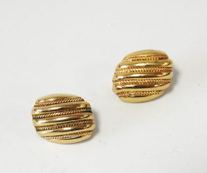 Christian DIOR
Pair of gilded metal ovoid...