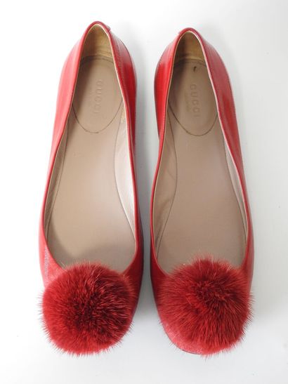 GUCCI
Pair of red leather ballet flats with...