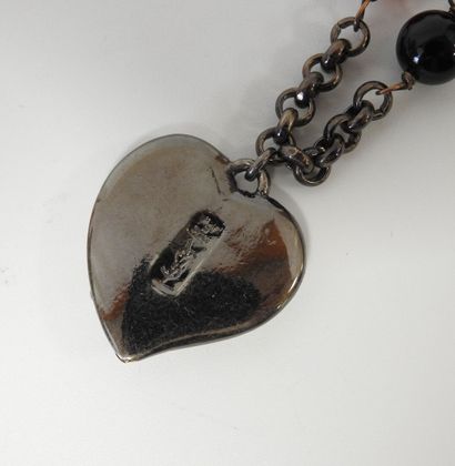 Yves SAINT LAURENT
Patinated metal bracelet...