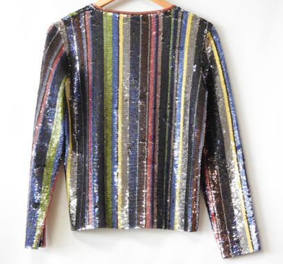 KENZO - Fashion show
Jacket decorated with...