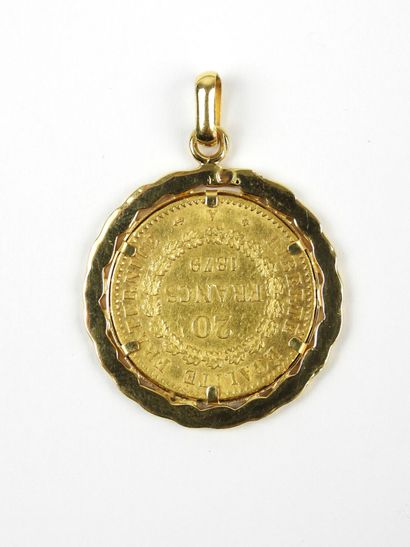 MEDAILLON en or jaune 750/1000° avec monnaie...