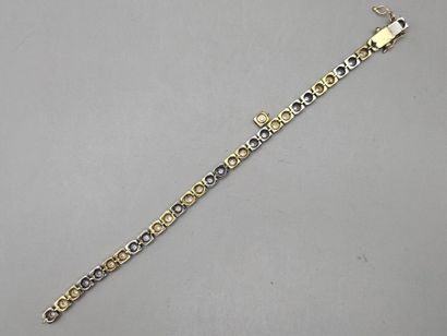BRACELET LIGNE articulé en or jaune et gris...