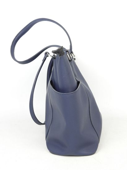 LACOSTE - Paris. Blue canvas handbag. 25...
