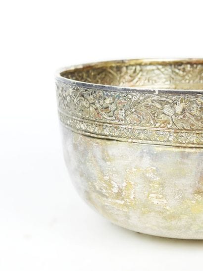 Circular silver CUP with chased floral frieze....