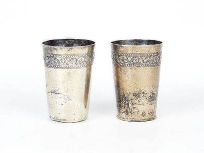 TWO silver GOBELETS with chased floral frieze...