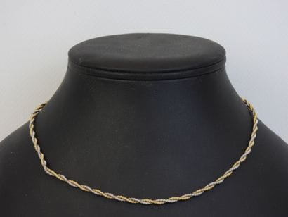 Twisted necklace in yellow and white gold,...
