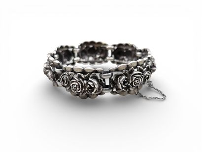 BRACELET ARTICULÉ et mouvementé en argent...
