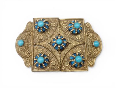 PF. 
Boucle de ceinture en laiton à motifs...